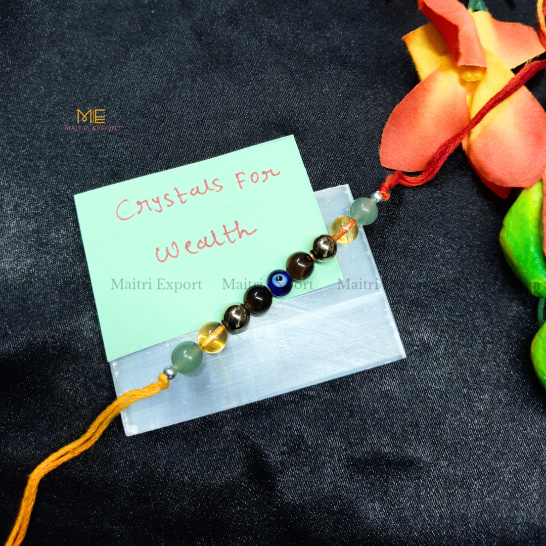Natural crystal stone purposed rakhi-Wealth-with evil eye bead-Maitri Export | Crystals Store