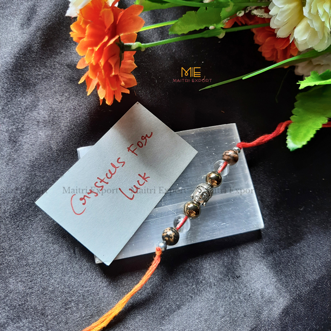 Natural crystal stone purposed rakhi-Luck-with buddha charm-Maitri Export | Crystals Store