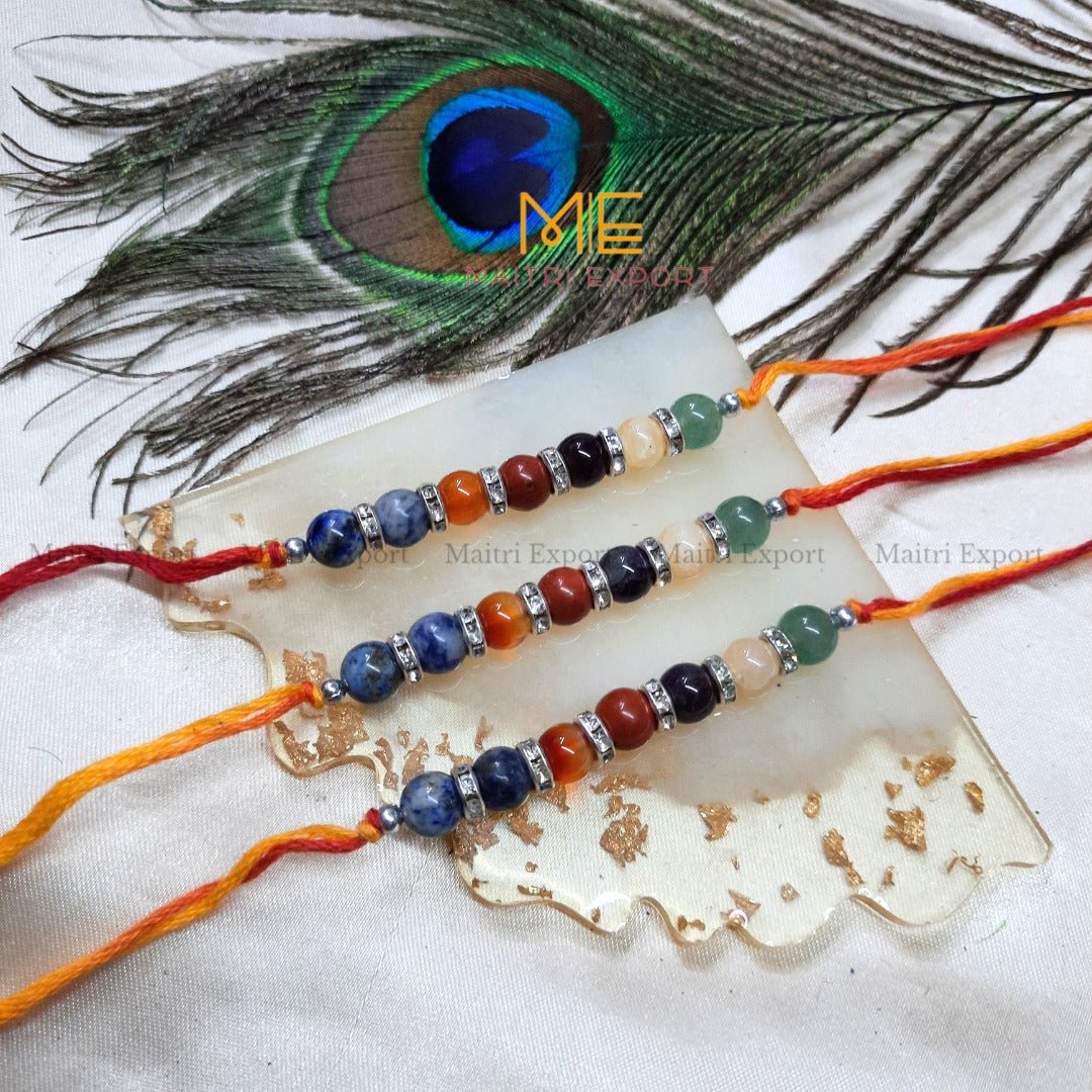 7 chakra rakhis-with kadi charm-Maitri Export | Crystals Store