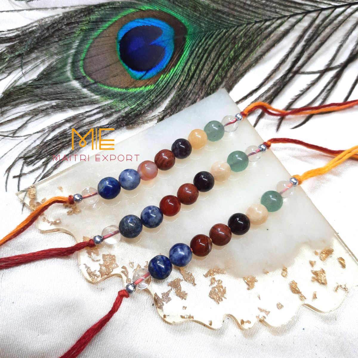 7 chakra rakhis-With clear quartz-Maitri Export | Crystals Store