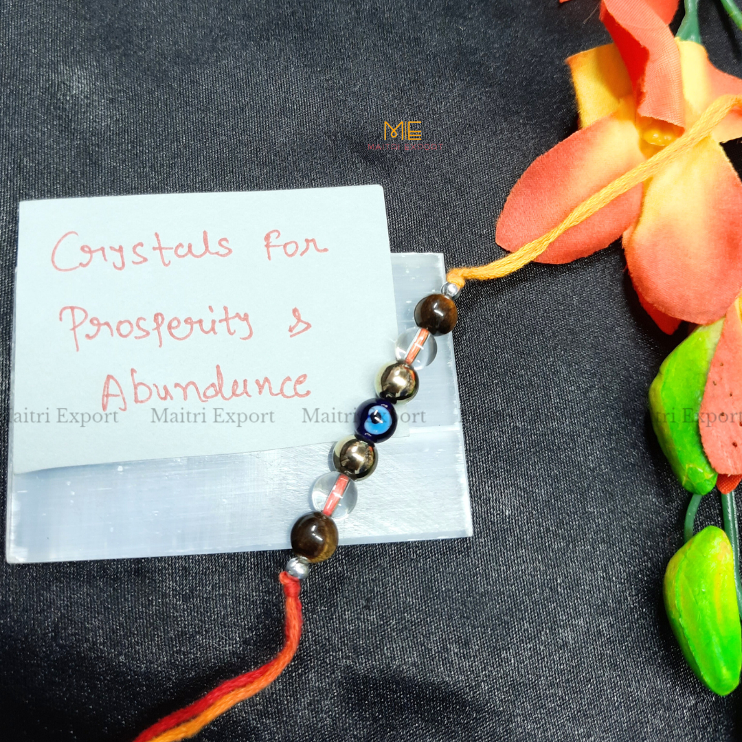 Natural crystal stone purposed rakhi-Prosperity & Abundance-with evil eye bead-Maitri Export | Crystals Store