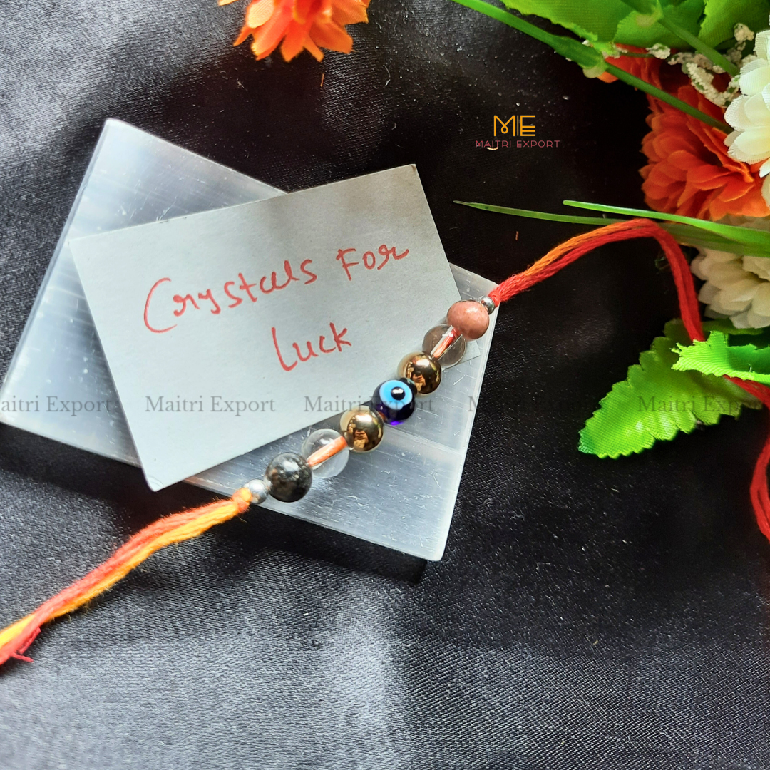 Natural crystal stone purposed rakhi-Luck-with evil eye bead-Maitri Export | Crystals Store