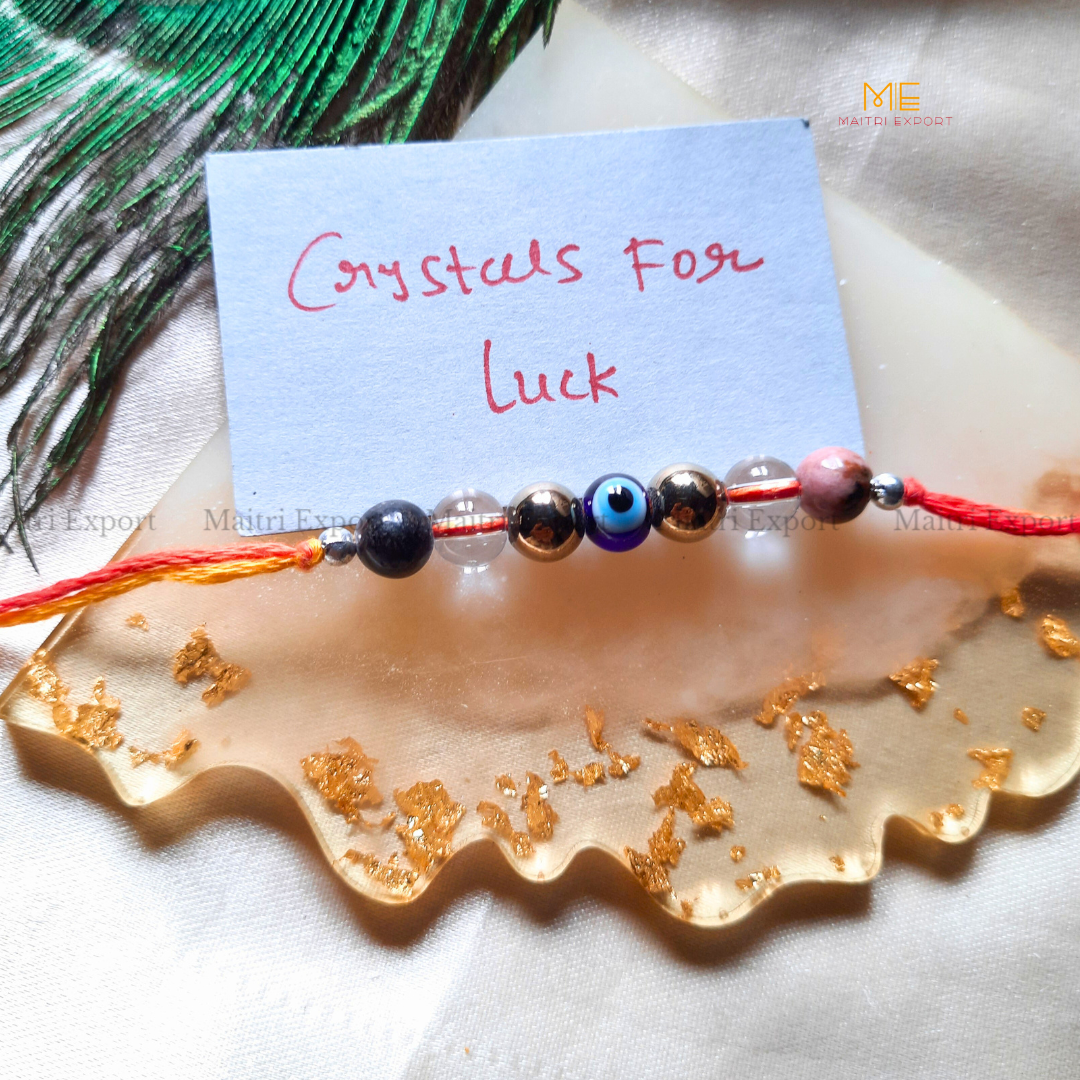 Natural crystal stone purposed rakhi-Maitri Export | Crystals Store