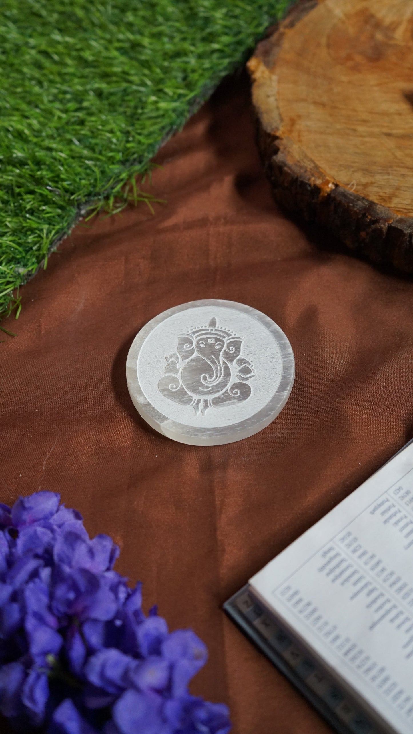 Natural selenite plate with different carvings 2 inch
