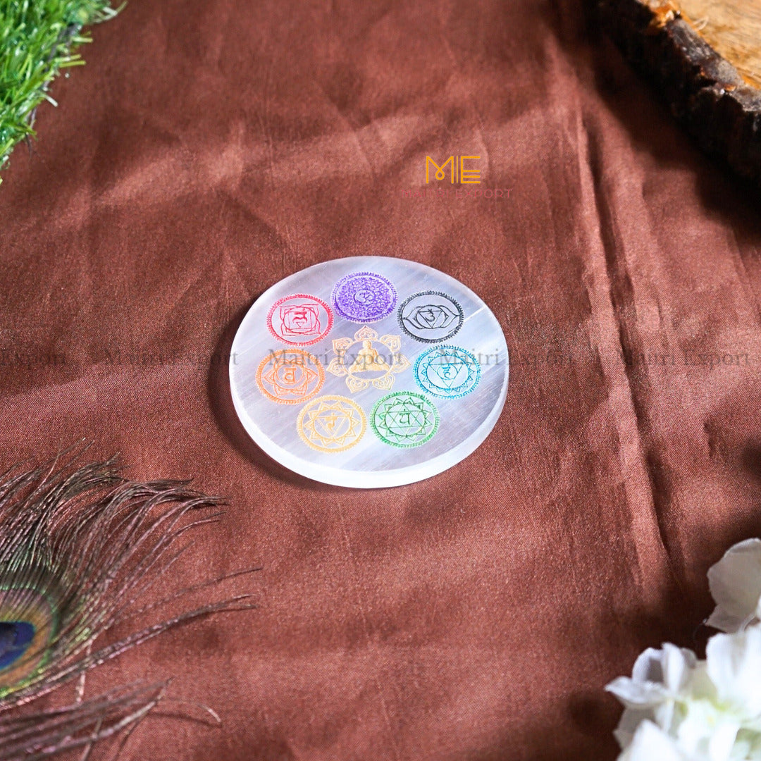 Natural selenite plate with different carvings 4 inch-Round-7 chakra Sanskrit Symbol Multicolor-Maitri Export | Crystals Store