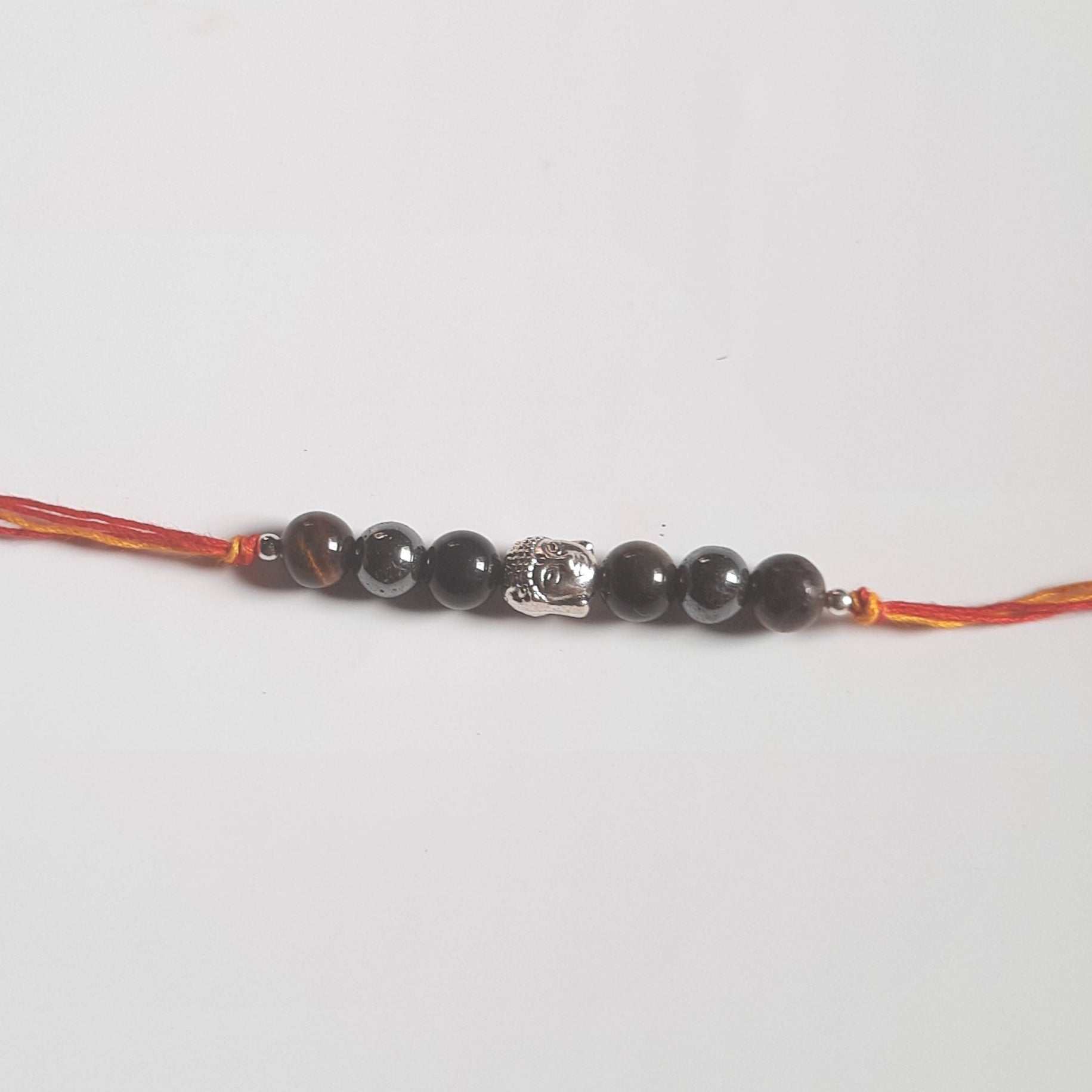 Triple protection rakhi-With buddha-Maitri Export | Crystals Store