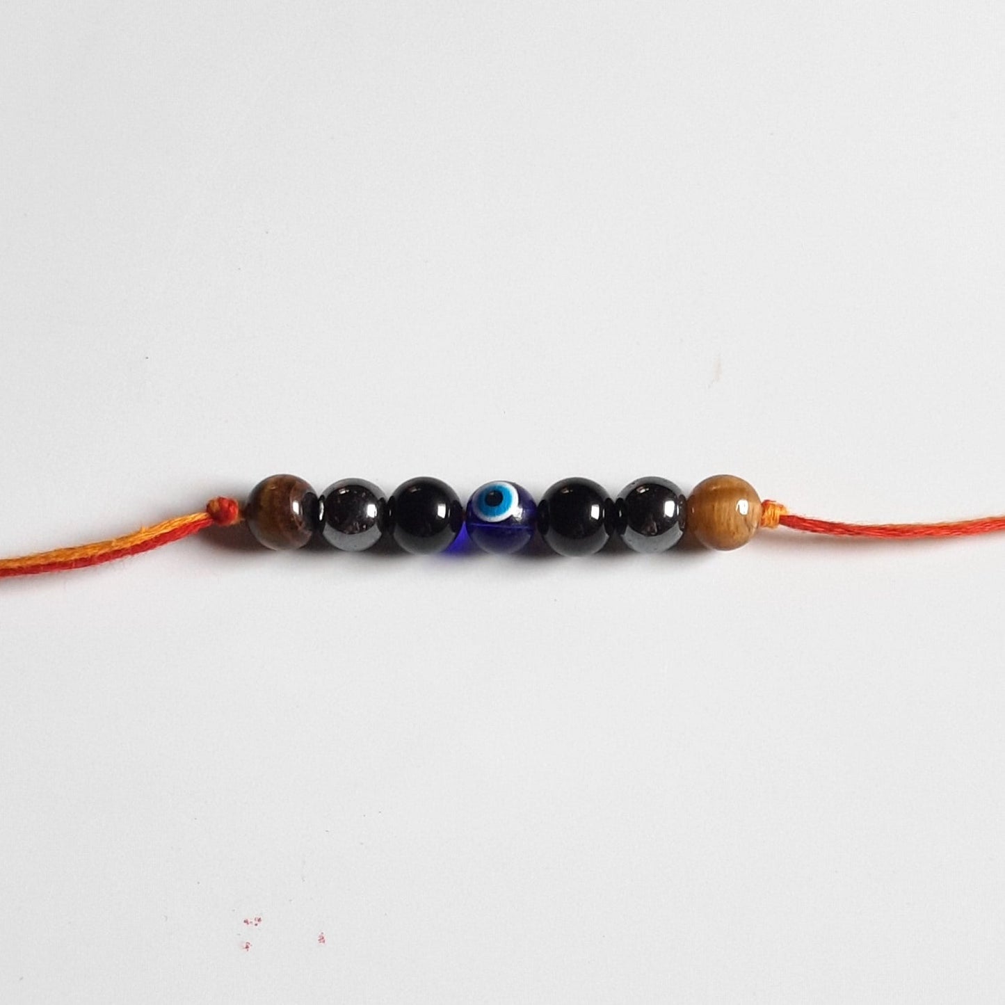 Triple protection rakhi-With evil eye-Maitri Export | Crystals Store