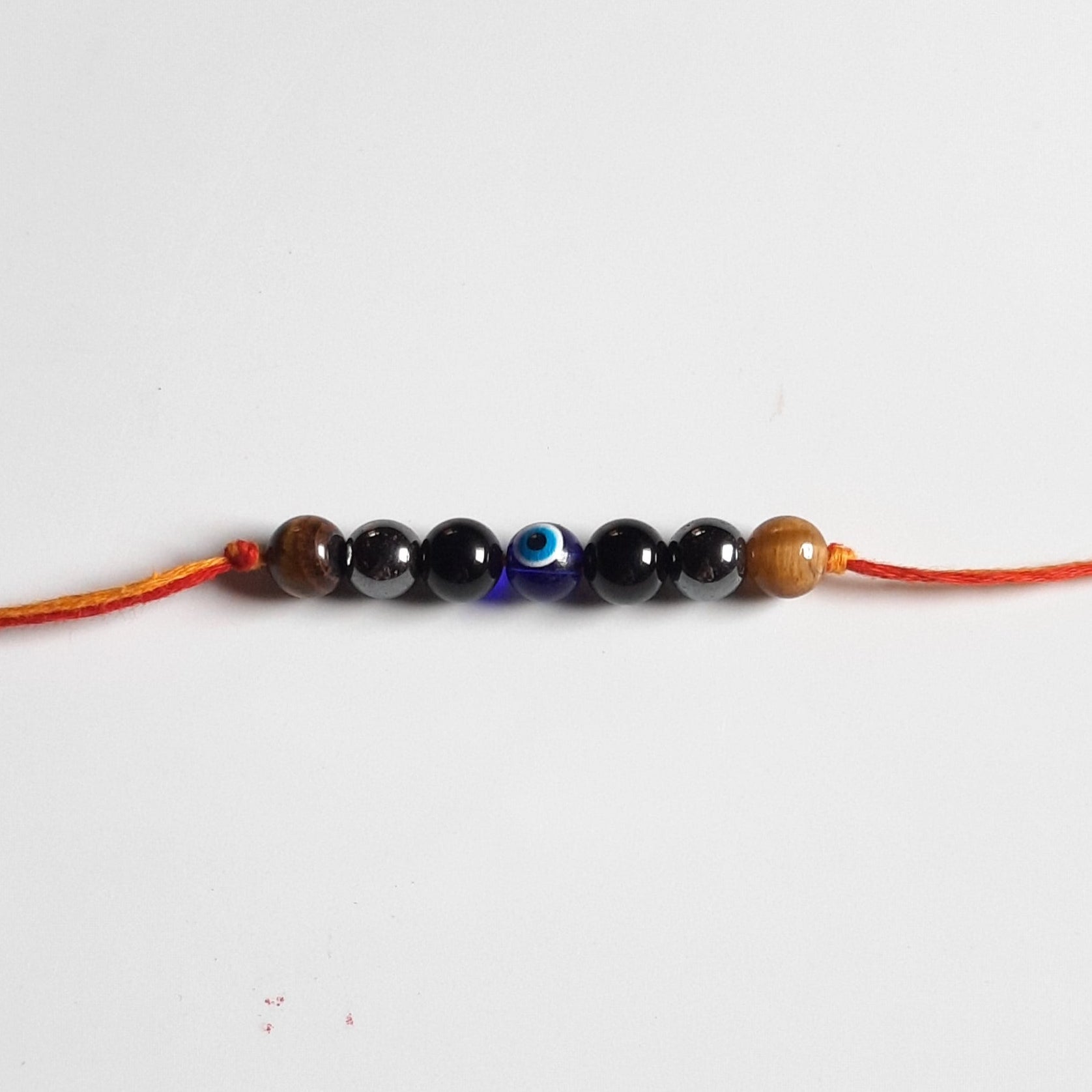 Triple protection rakhi-With evil eye-Maitri Export | Crystals Store