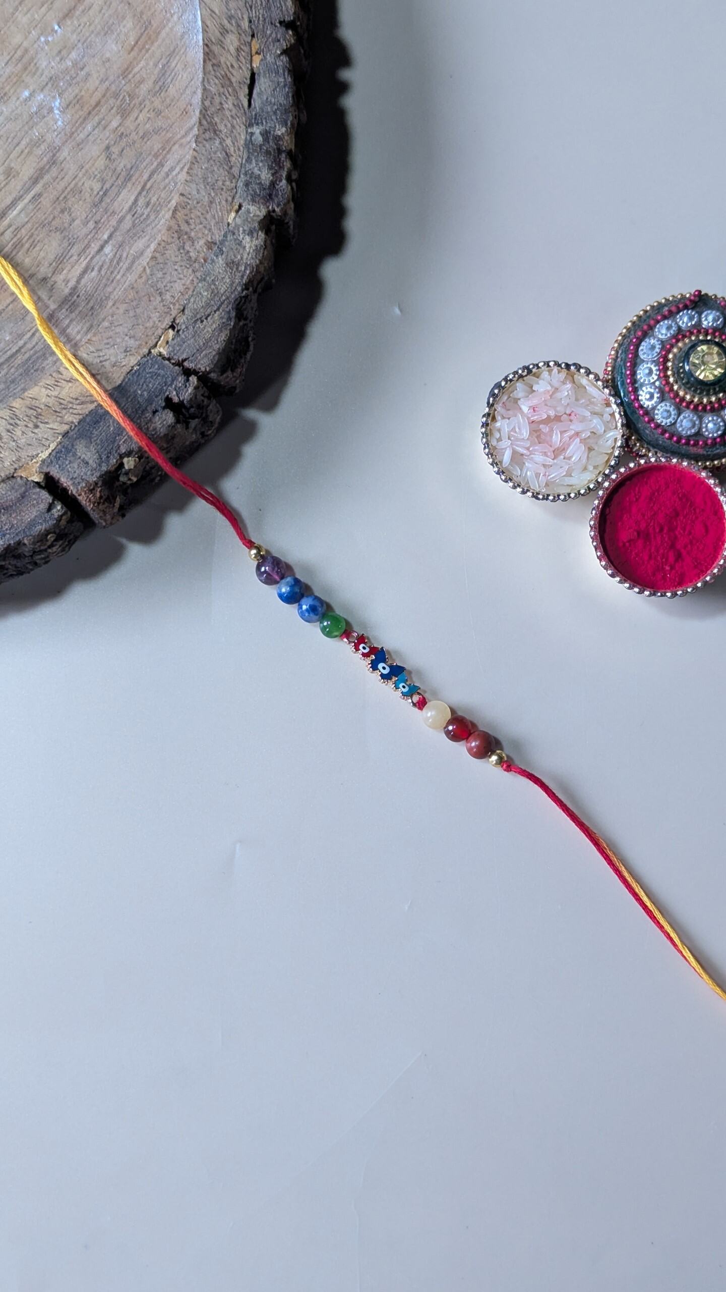 Triple evil eye rakhi with 7 chakra 6mm beads-Butterfly-Maitri Export | Crystals Store