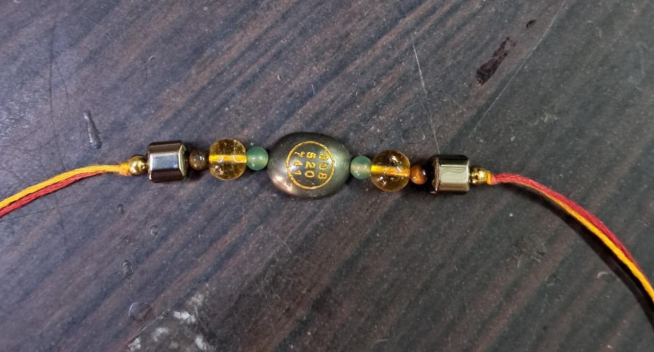 Pyrite oval zibu rakhi with Golden pyrite square, citrine, green aventurine and tiger 4mm beads-Maitri Export | Crystals Store