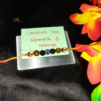 Natural crystal stone purposed rakhi-Strength &amp; Courage-with evil eye bead-Maitri Export | Crystals Store