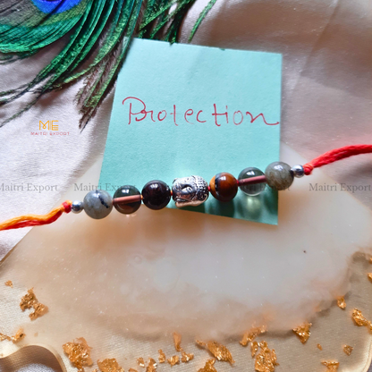 Natural crystal stone purposed rakhi-Maitri Export | Crystals Store