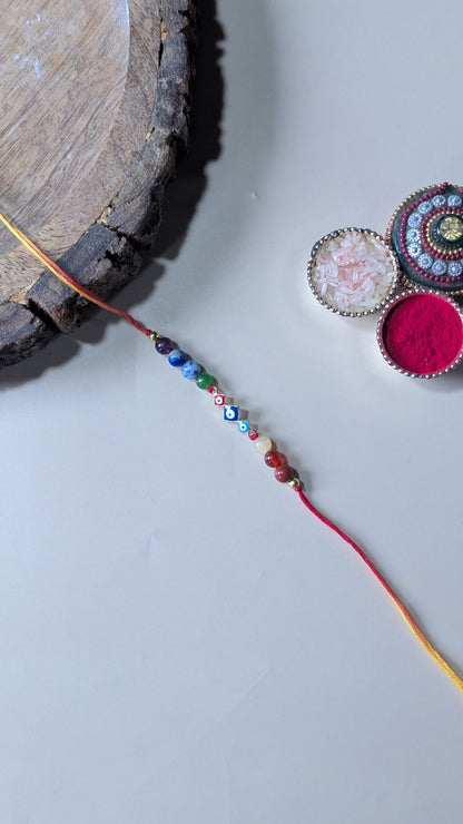 Triple evil eye rakhi with 7 chakra 6mm beads-Kite-Maitri Export | Crystals Store