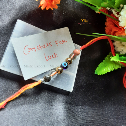 Natural crystal stone purposed rakhi-Luck-with evil eye bead-Maitri Export | Crystals Store