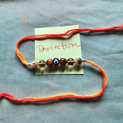 Natural crystal stone purposed rakhi-Maitri Export | Crystals Store