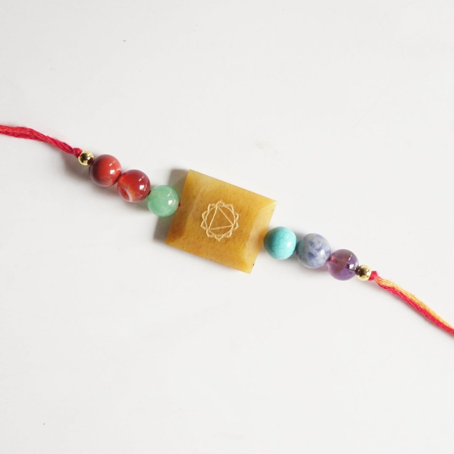 7 chakra with each chakra symbol rakhi-Yellow aventurine-Maitri Export | Crystals Store