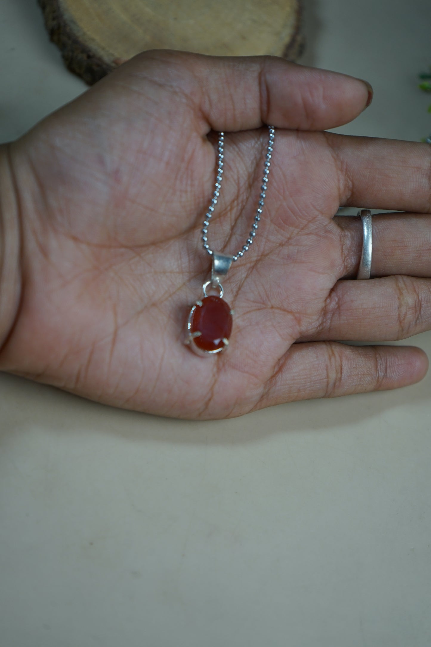 Diamond cut oval pendants-Carnelian-Maitri Export | Crystals Store