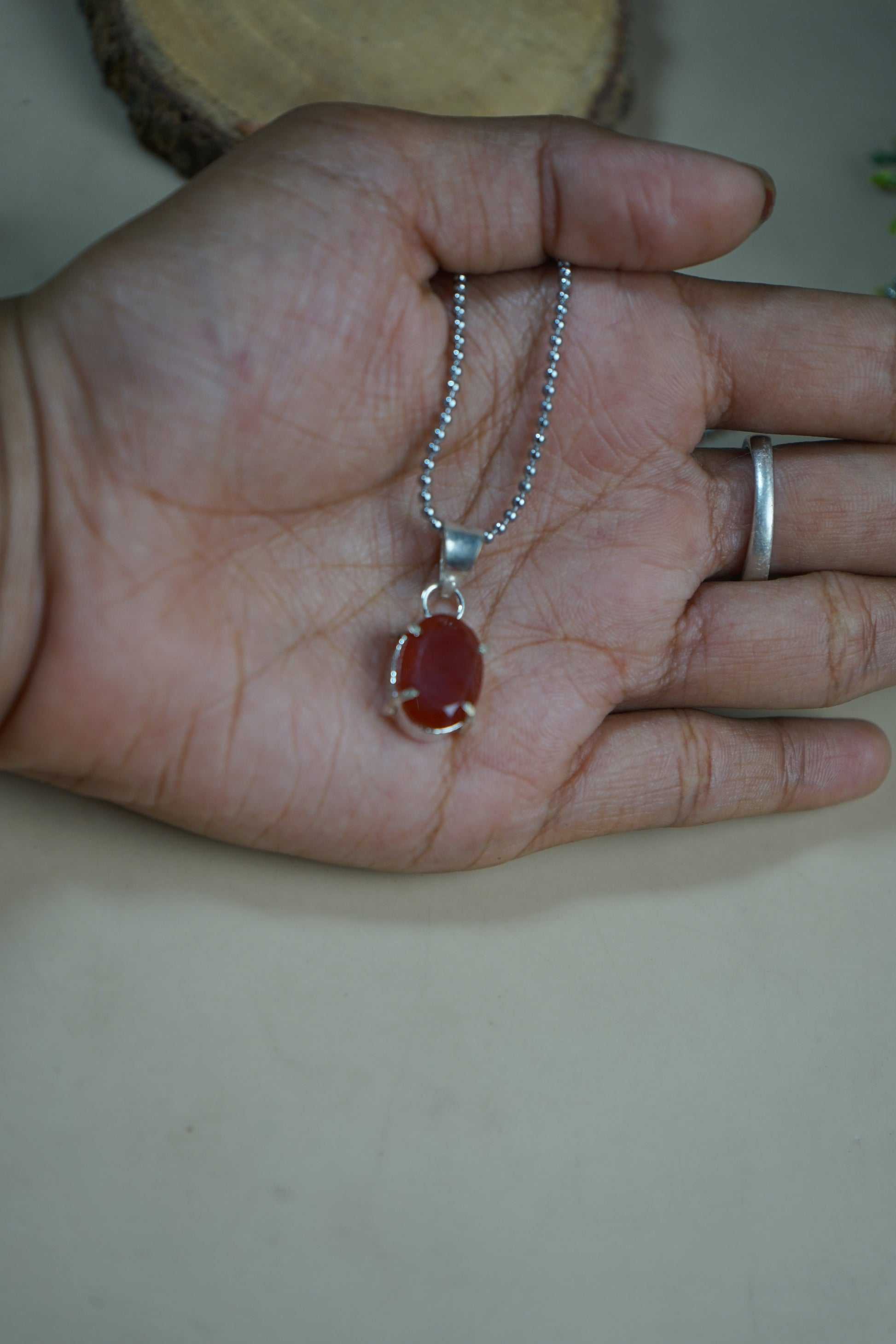 Diamond cut oval pendants-Carnelian-Maitri Export | Crystals Store