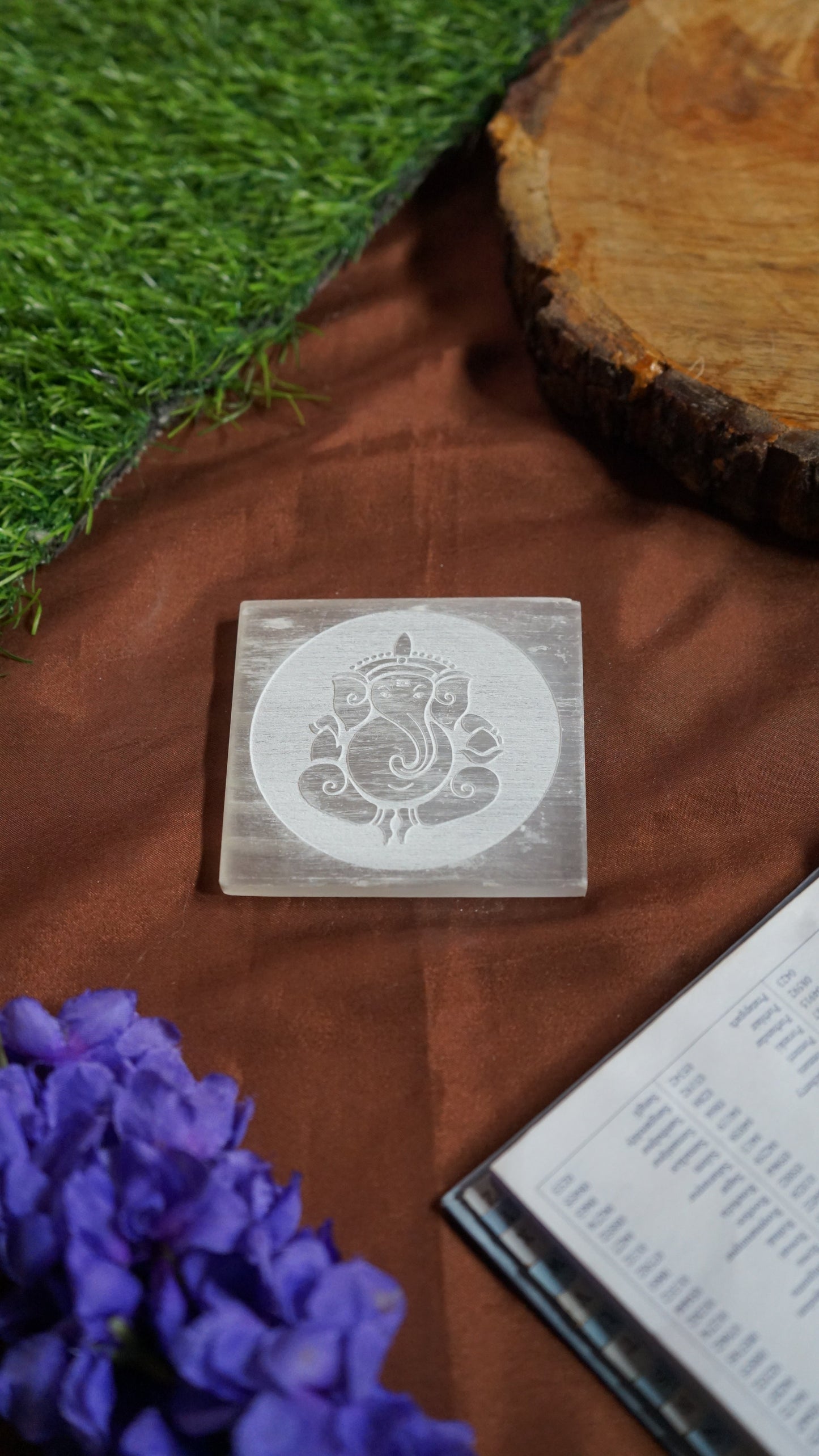 Natural selenite plate with different carvings 2 inch