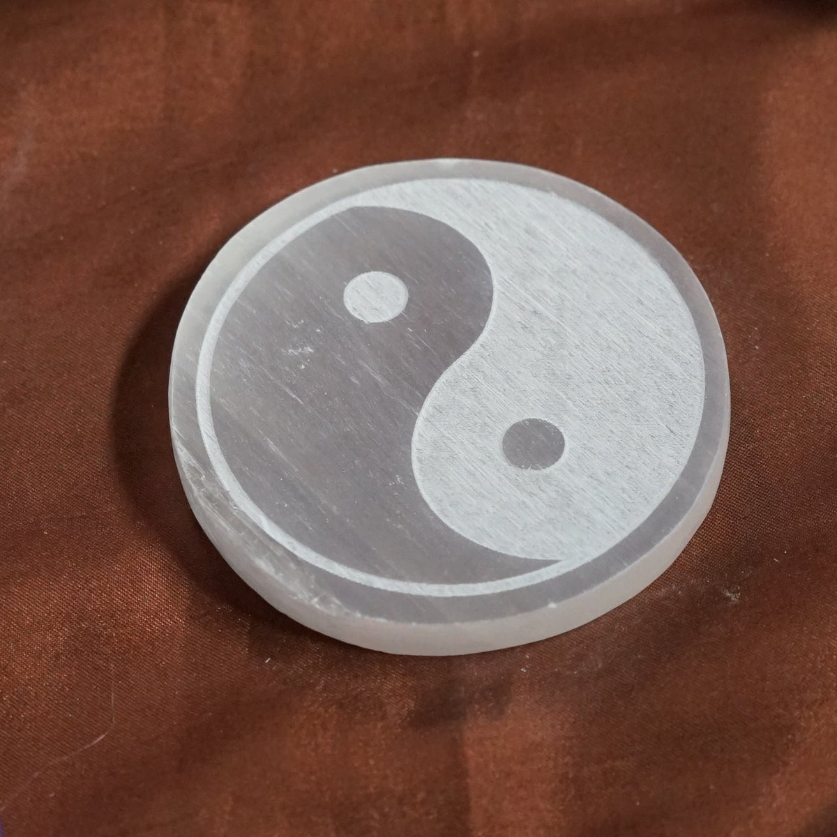 Natural selenite plate with different carvings 2 inch-Round-yin yang-Maitri Export | Crystals Store