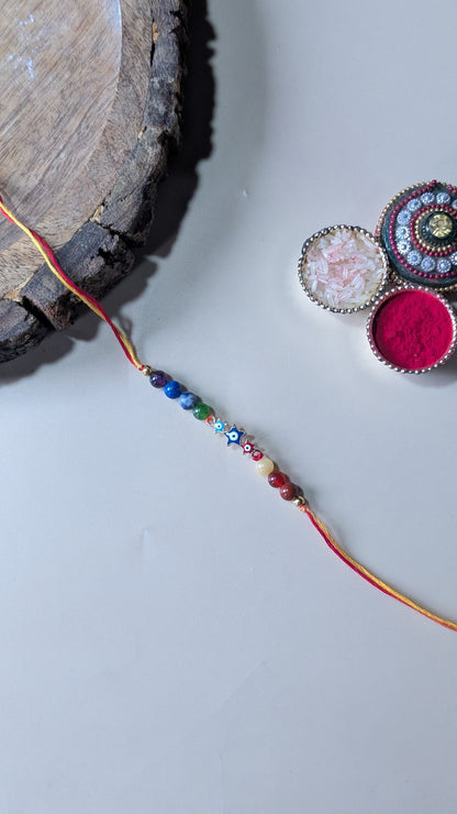 Triple evil eye rakhi with 7 chakra 6mm beads-Star-Maitri Export | Crystals Store