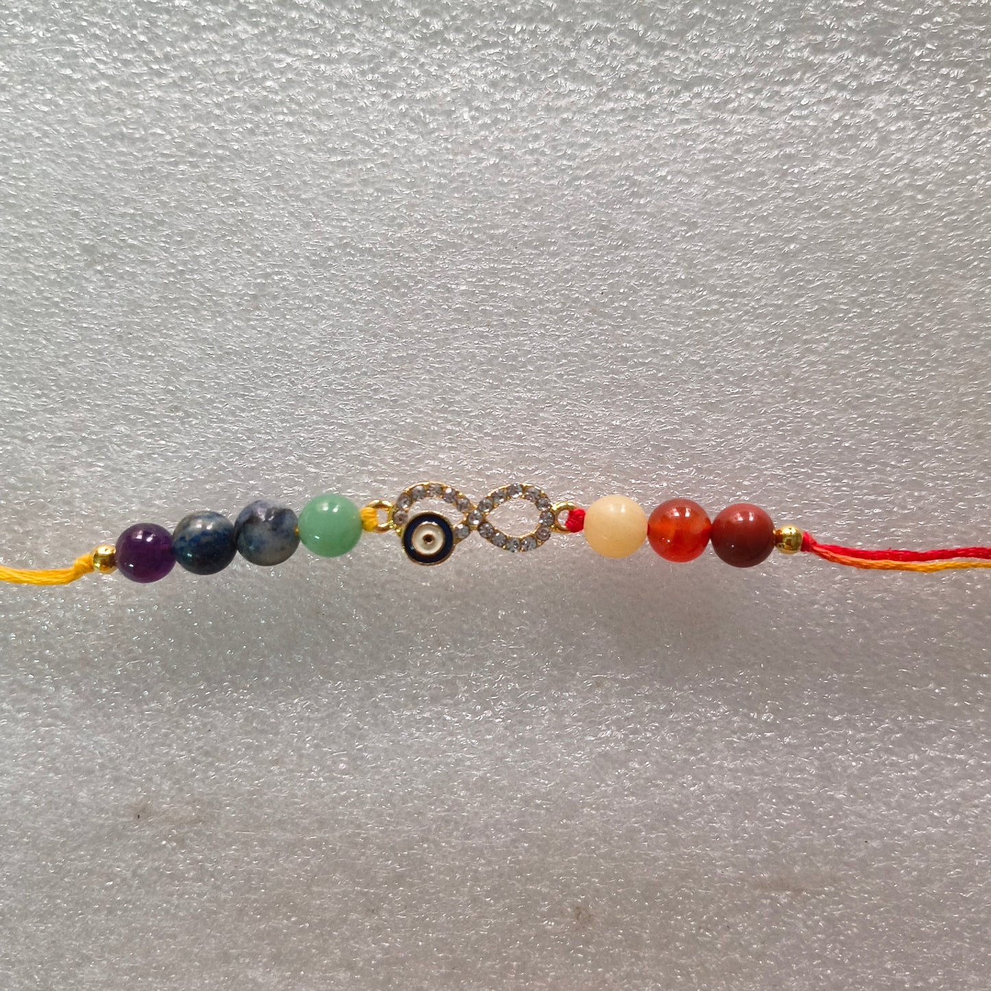 Rakhis with infinity ♾️ charm-Seven chakra with infinity charm-Maitri Export | Crystals Store