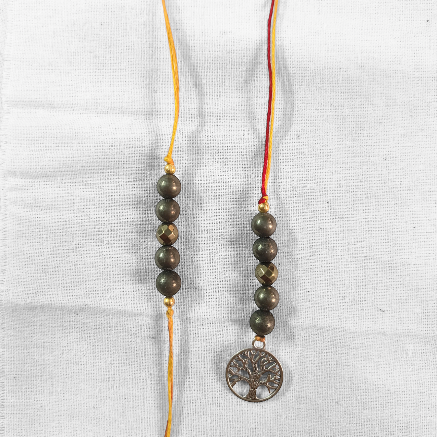 Pyrite rakhi and lumba pair-Maitri Export | Crystals Store